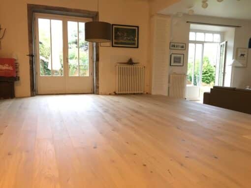 Pose de parquet en Bois dans le salon d’une Maison à Barberaz en Savoie