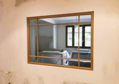 Création de Verrière design en bois dans la cuisine d’un appartement à Chambéry en Savoie